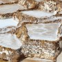 Salt harvesting in the salt mines of Maras, Peru, in the Sacred Valley of Urubamna, near Cusco.