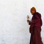 Buddhist priest with prayer wheel, Ladakh, India